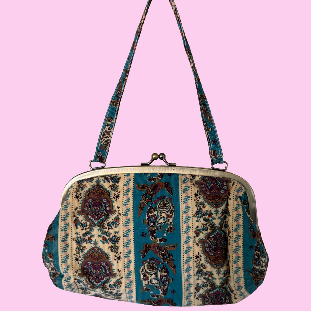 Corduroy patterned sequined purse