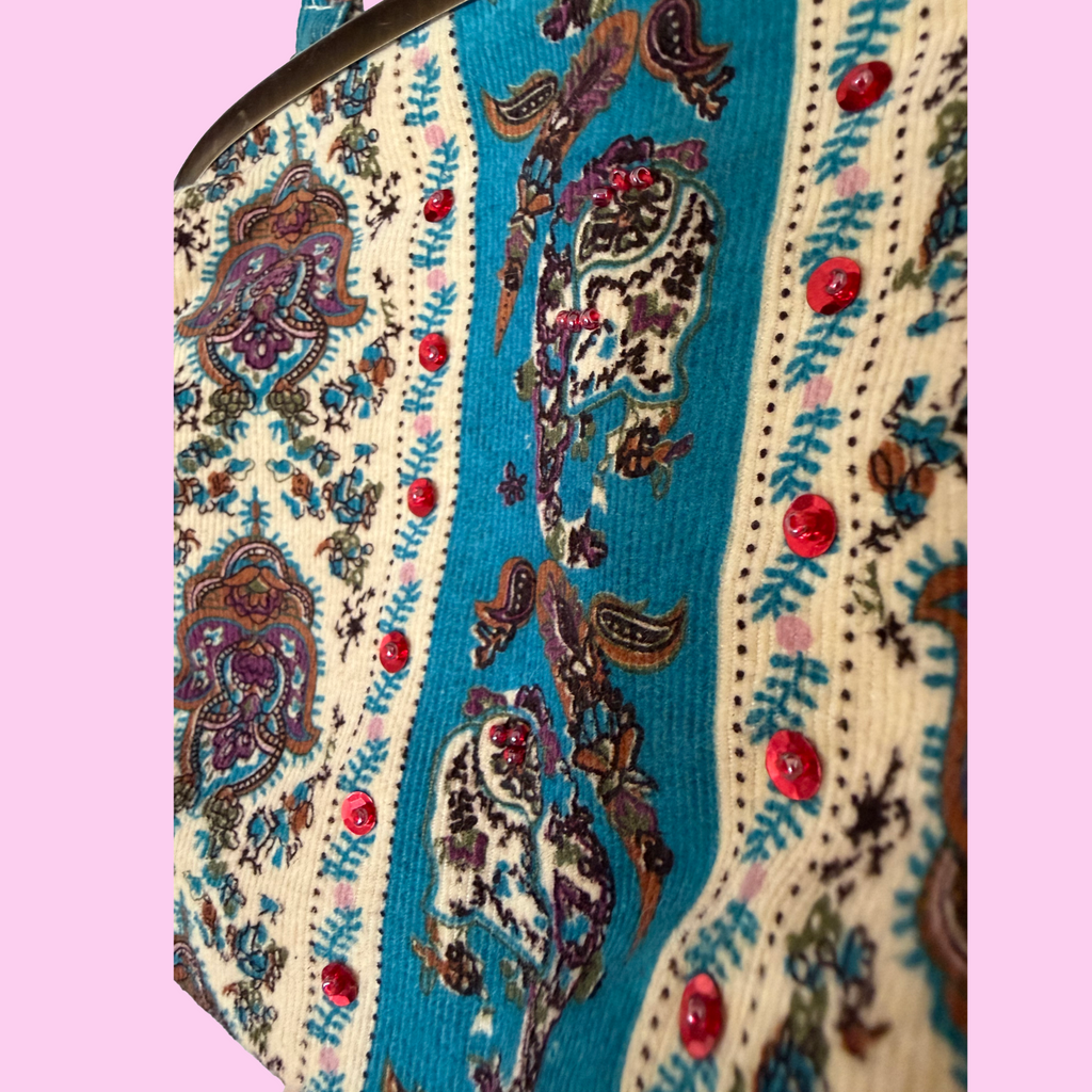Corduroy patterned sequined purse