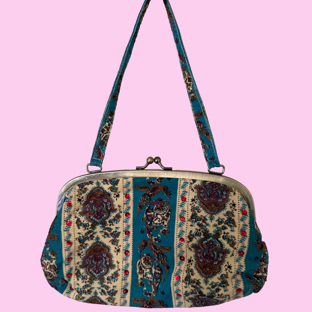 Corduroy patterned sequined purse