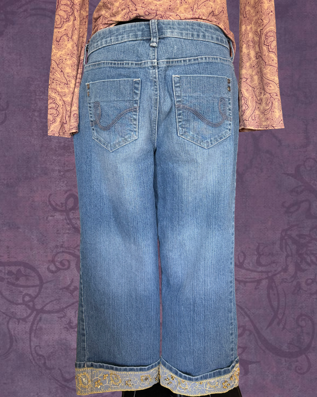 Folded sequined jeans